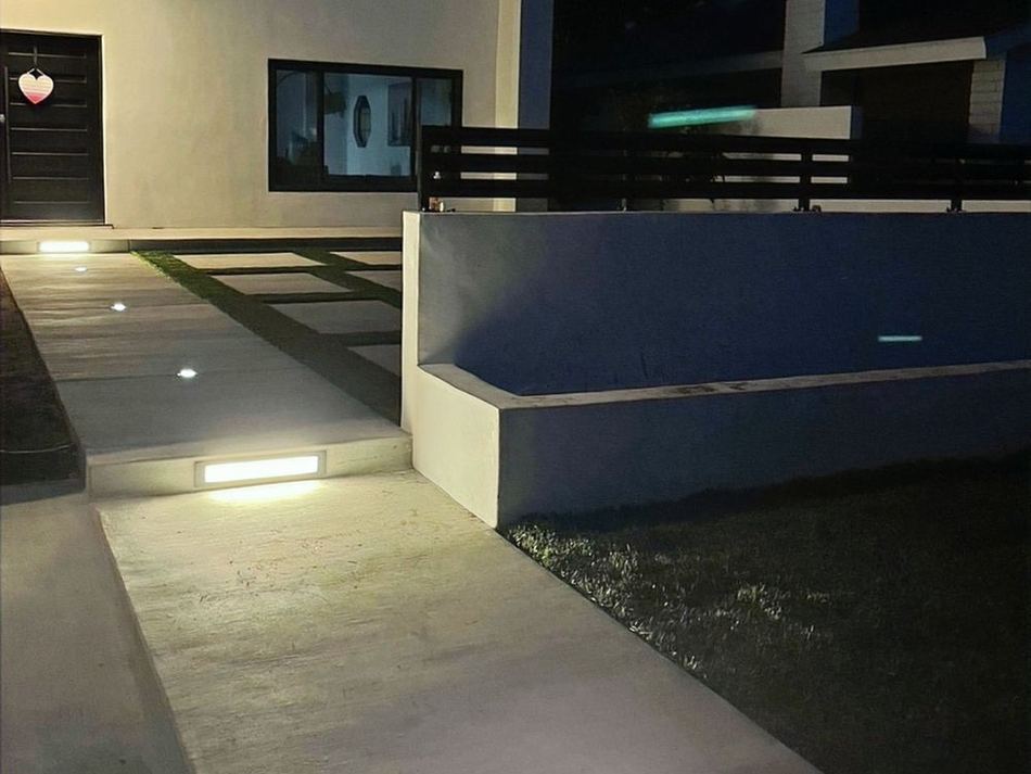 Modern white house with new hardscape