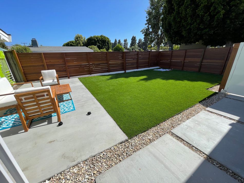 Mid Century Ranchos back yard fence and turf